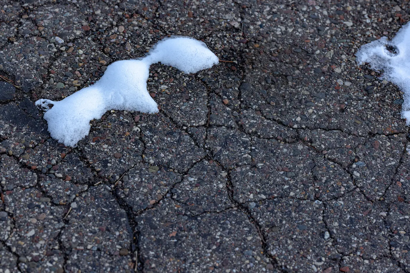 Why Colorado’s Freeze-Thaw Cycle Destroys Your Pavement — And What Actually Stops It